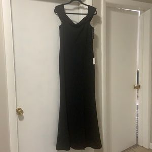 Lulu’s slim fitting black off the shoulder dress.